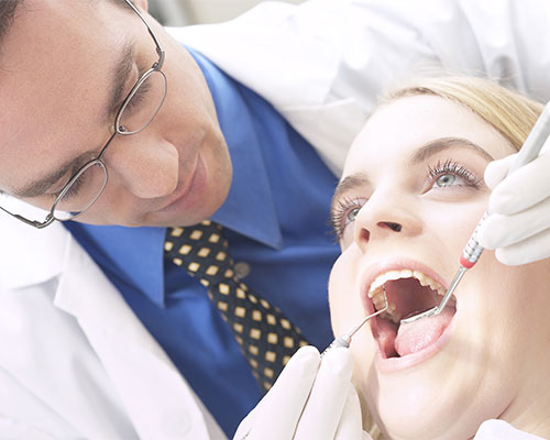 woman during dental hygiene appointment at Crescent Lodge Dental Practice in Clapham