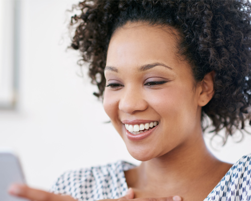 woman with whiter teeth in Crescent Lodge Dental Practice in Clapham