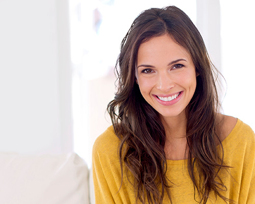 Woman with dental veneers at Crescent Lodge Dental Practice in Clapham