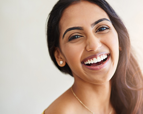 Brunette woman in South West London with big smile