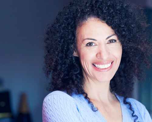 woman with great teeth at our Clapham dental practice smiling